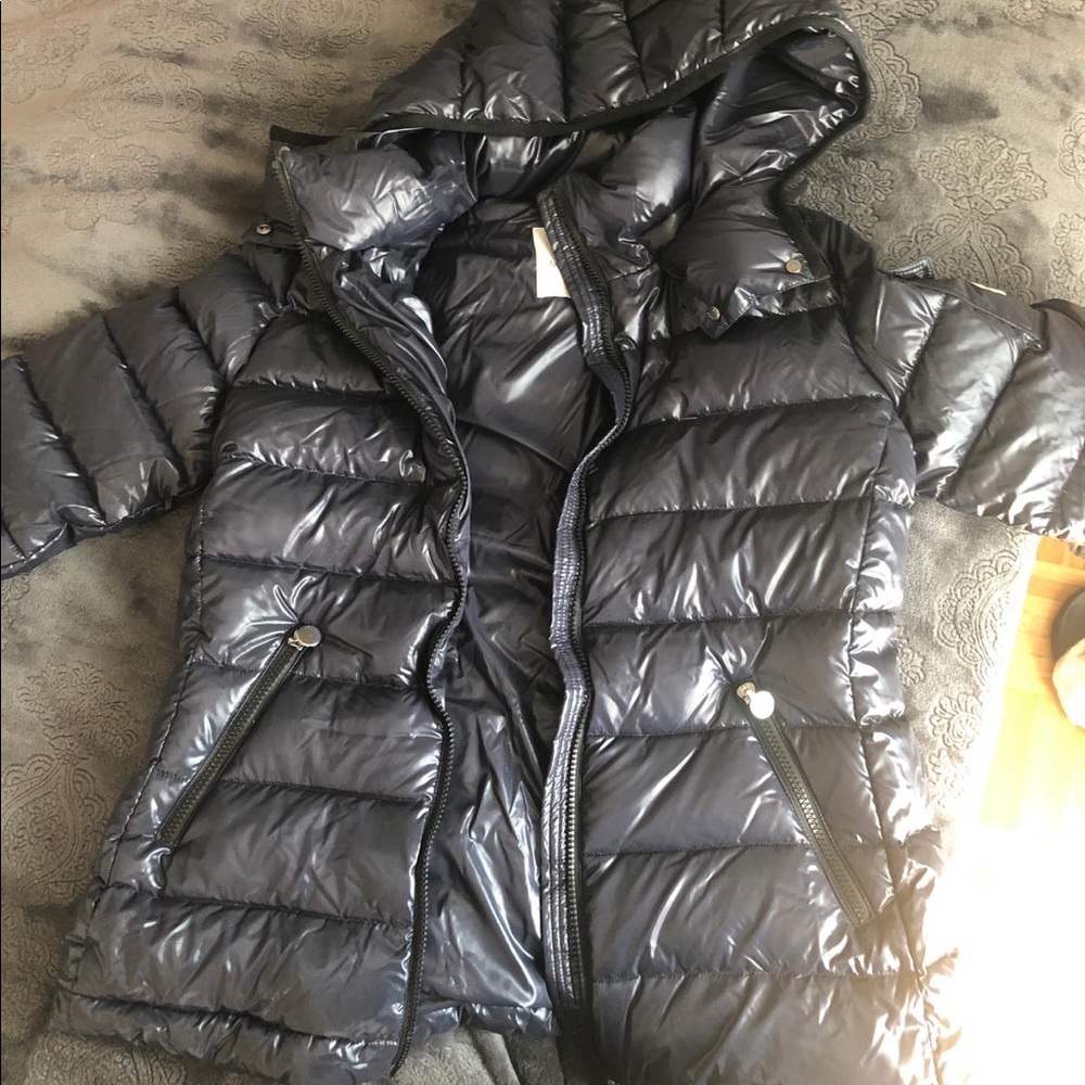 Moncler coat never been worn.